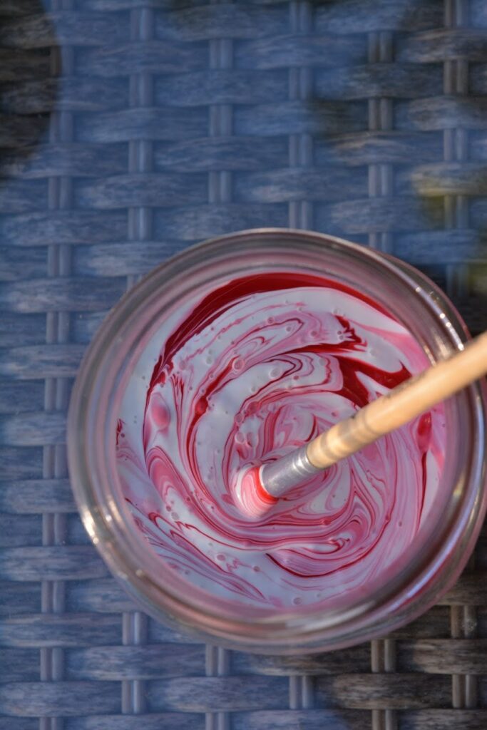 White mixing with red to make pink