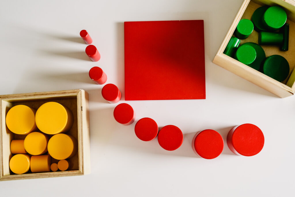 Loose parts used in early childhood education to support unscripted, child-led play, showing open-ended materials inviting exploration, creativity, and learning beyond scripted teaching practices.